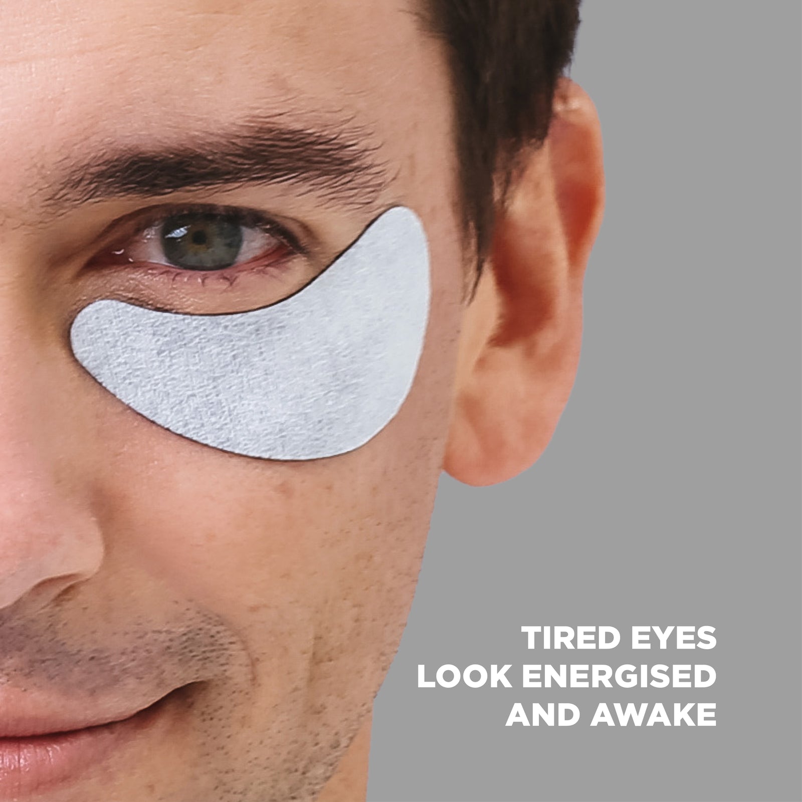 Man wearing charcoal under eye mask: tired eyes look energised and awake